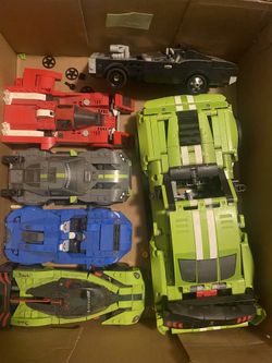6 Lego racing cars + other lego pieces and people