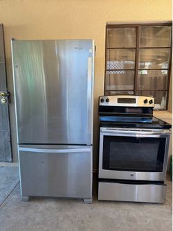 Whirlpool refrigerator and electric stove