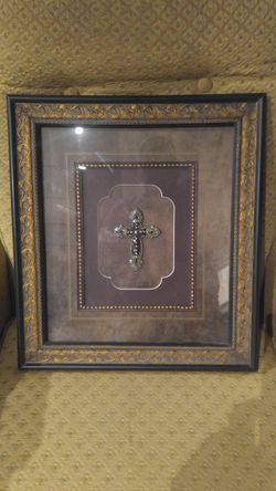 Cross with frame