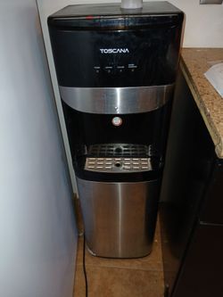 Bottom loading water dispenser. Works great. Moving need gone.