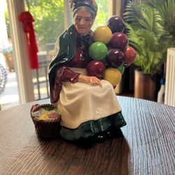 Royal Dalton (HN1315)  Lady Figurine Of  The Old Balloon Seller. Perfect Condition