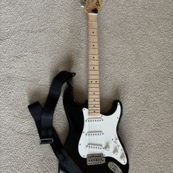 Starcaster By Fender Electric Guitar and Fender Champions 20 70 watt Amp