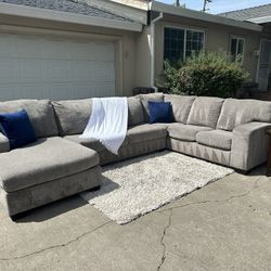 Free delivery Ashley Furniture gray U-shaped sectional couch retails $1600