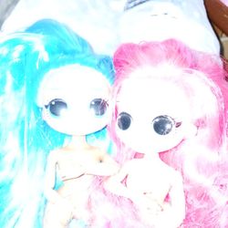 2 LOL OMG Dolls, (clothes Not Inculded.)