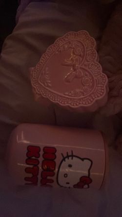 Cute hello Kitty jar and makeup brush holder!