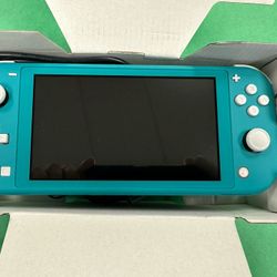Brand New Turquoise Nintendo Switch Lite + Miraculous: Paris Under Siege