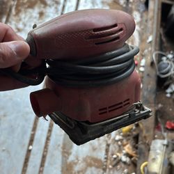 Red electric sander
