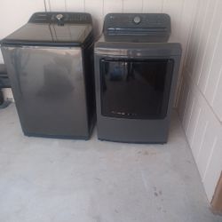 One samsung , one l g washer and dryer