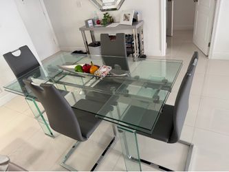Glass dinner table and chair