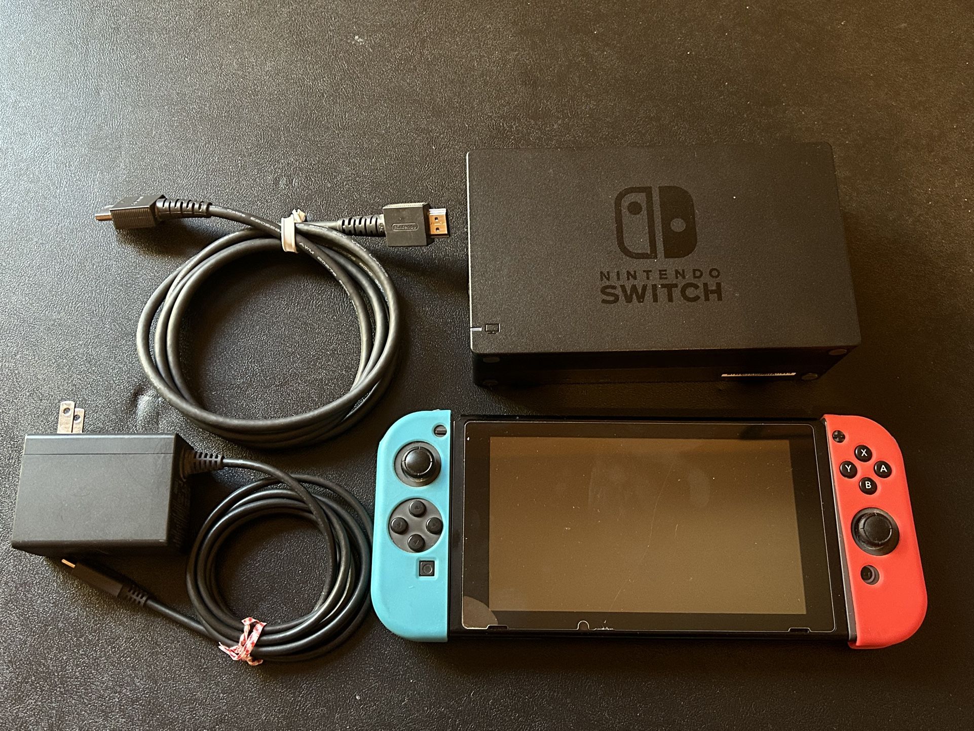 Unpatched Switch with screen protector, dock and cables. Everything is tested and working. Serial number: XAW10033 I am also selling other Nintendo