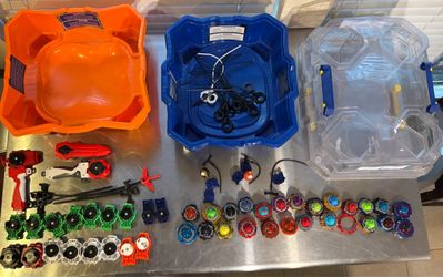 Large Beyblade Collection with 3 Arenas