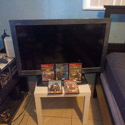Sharp Tv And PS2 Games 
