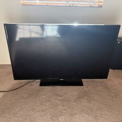 TV WITH REMOTE ( BIG HOME SALE EVERYTHING HAS TO GO )