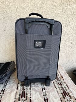 Grey Soft-Sided Rolling Suitcase.