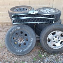 2 Sets Of Wheels  & Front Grill. 2007- 2013 Chevy Tahoe/suburban