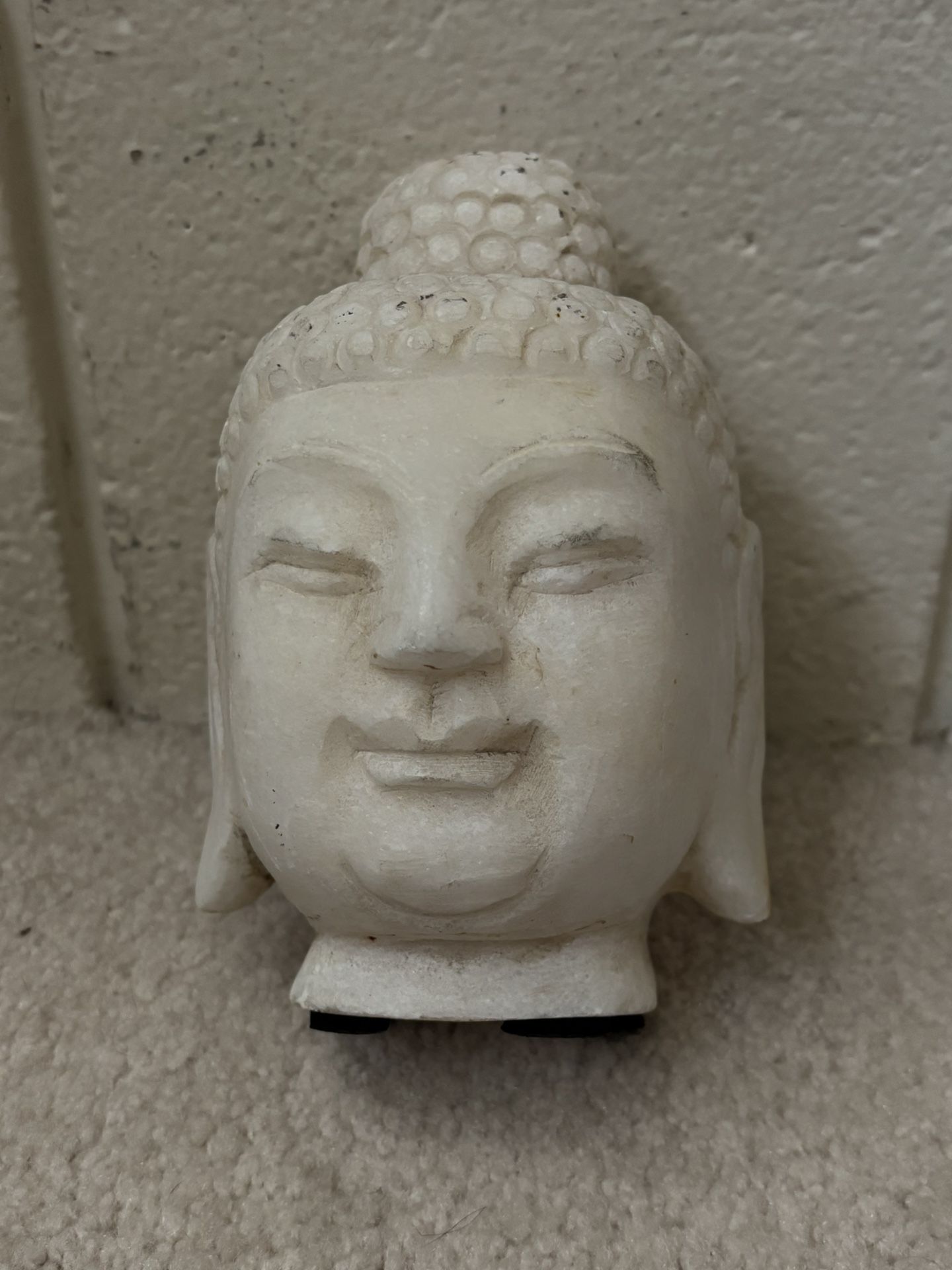 Buddha head sculpture