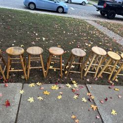 eight Solid stool chairs.  
