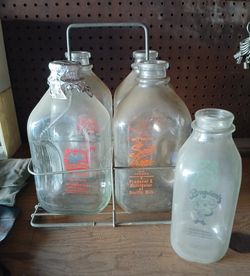 Old Milk Bottles And Rack