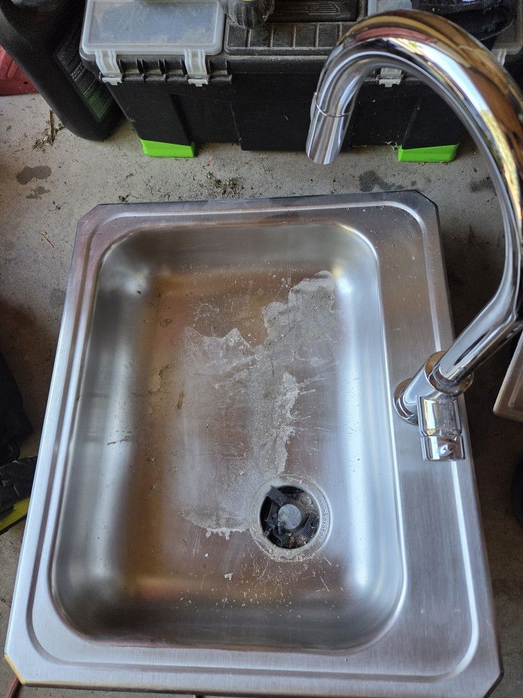 Sink And Commercial Grade Faucet 