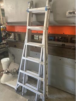 Used Werner multipurpose telescoping ladder