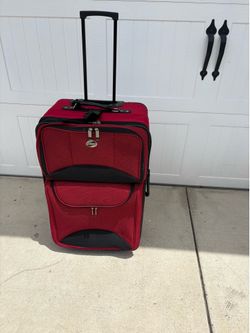Red luggage 28” height