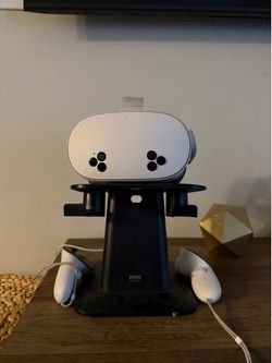 Meta Quest 3S 256GB VR Headset with a stand to hold the headset