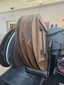 Seven 6-foot Round Wood Banquet Tables