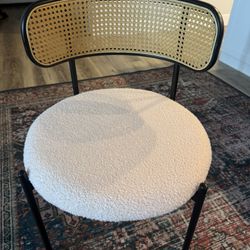 4 Black Rattan Chairs With Peach Colored Seats  