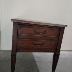 Cherry wood antique end table with wheels by Columbia furniture on wheels