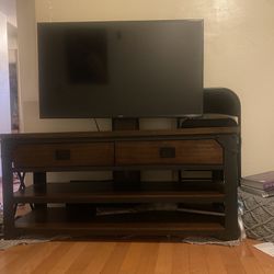 Big Entertainment Center And Nice Smart Tv Must Take Both