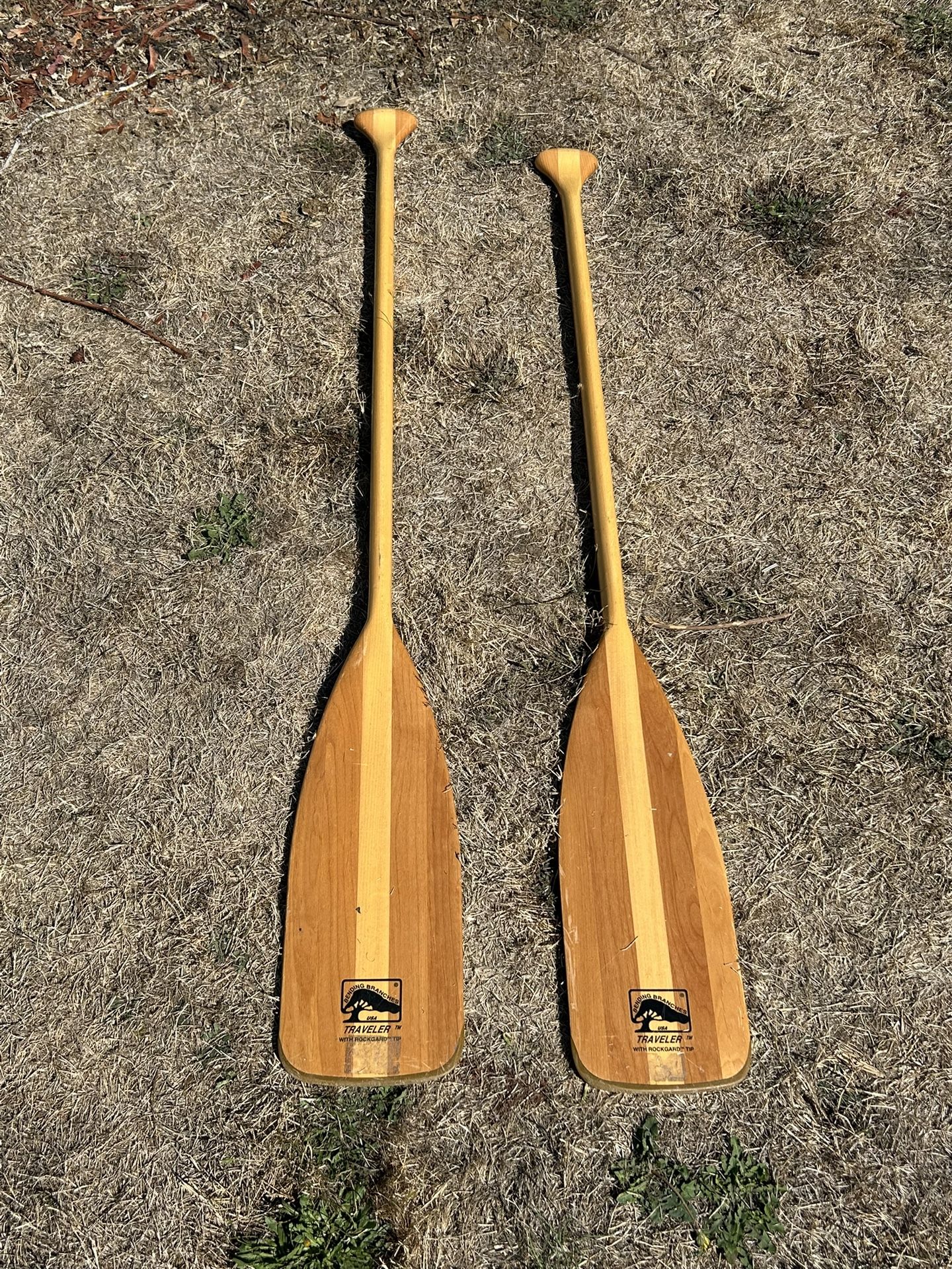 2 Wooden Bending branches traveler with rock guard tips canoe paddles 54 & 51 inches in good shape only very minor scratches. Lots of life left in the