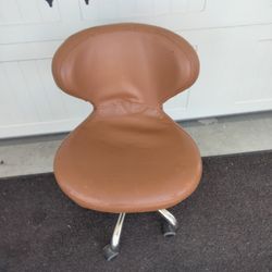 Rolling Chair that goes up, down and swivels 