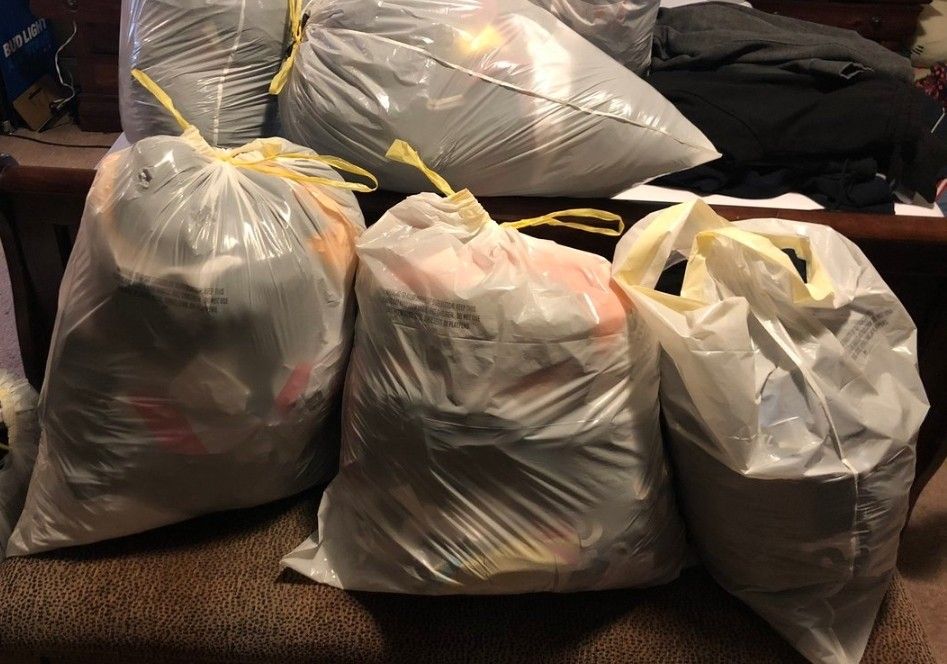 10 Bags full of Shoes and Clothes .All for 100$