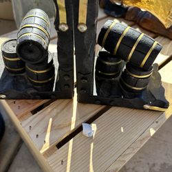 This is a pair of vintage carved wooden barrel bookends