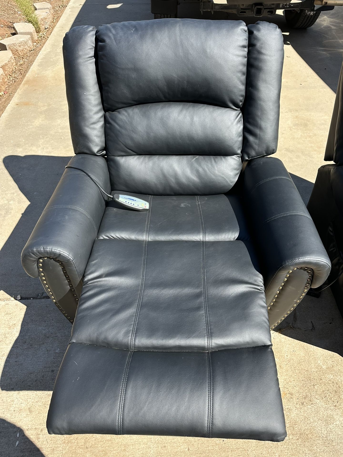 2 Faux Leather Recliner Chairs