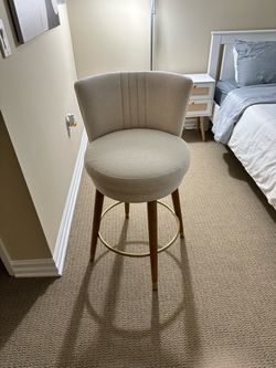 Upholstered Bar Stool with Gold Footrest