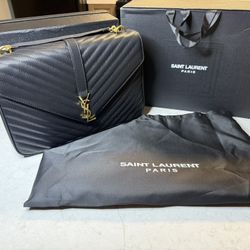 Authentic YSL black leather monogram bag