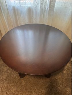 Wood round table 34 inches around and 30 inches height.