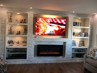 Entertainment center with fireplace and surround sound