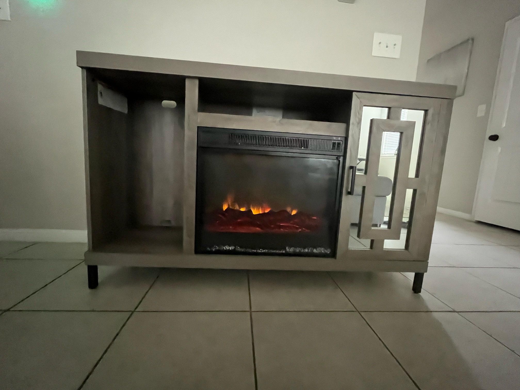 Modern Grey Fireplace TV Stand – Mirrored Cabinet Doors