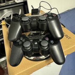 PS3 Controllers And Stand