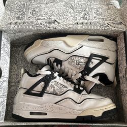 Jordan 4 Black And White With Designs On The Side 
