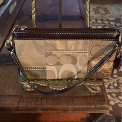 Coach Gold Leather Trimmed Wristlet Clutch