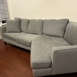 Stylist Sage Green Sectional with a Cuddler