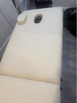 Massage table