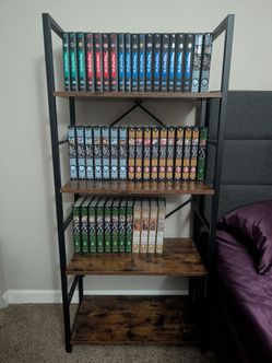 JoJo's bizarre adventure manga set plus book case