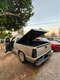 Hard shell truck bed lid cover