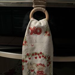 Homemade crochet oven towel holder with towel  
