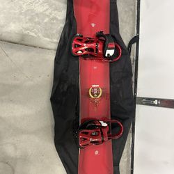 Red Triumph Snowboard with Bindings 