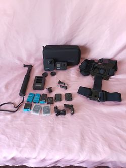 Go pro 360 camera and 8 black camera with accessories